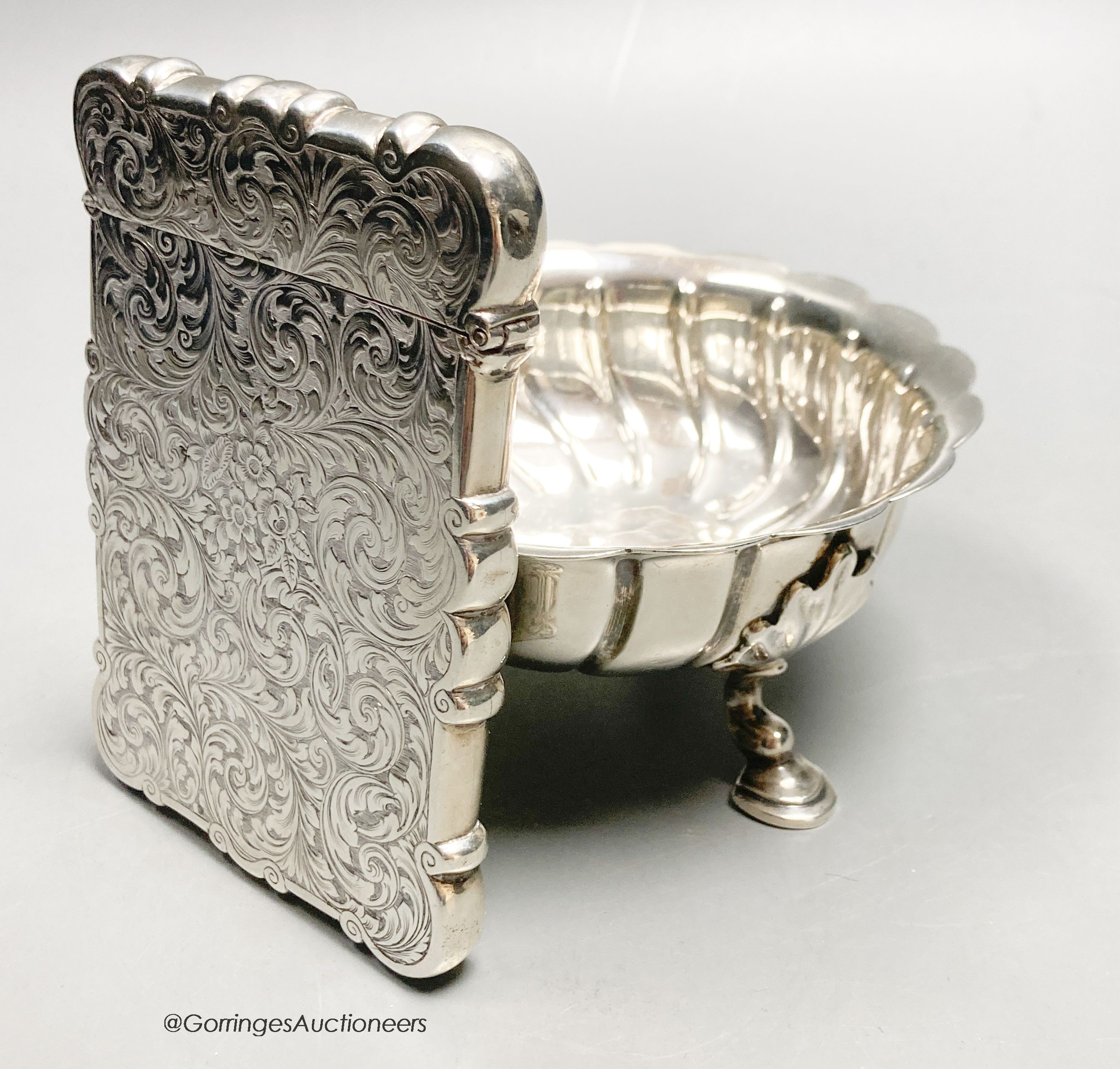 A Victorian engraved silver card case, Edward Smith, Birmingham, 1850, 10.4cm, together with a late Victorian silver sugar bowl, London, 1891, gross 197 grams.